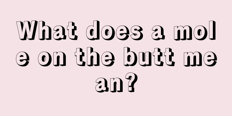 What does a mole on the butt mean?