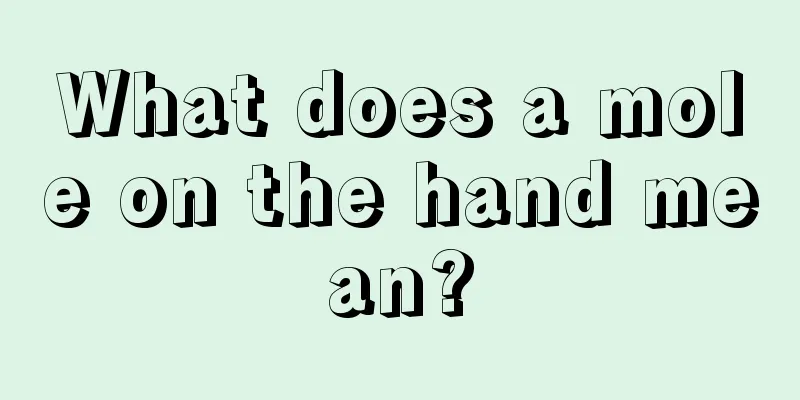 What does a mole on the hand mean?