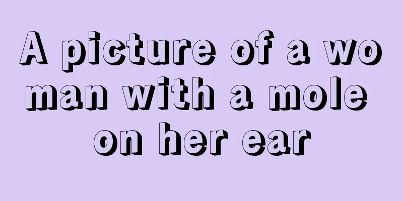 A picture of a woman with a mole on her ear