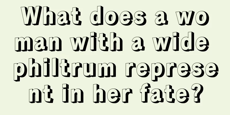 What does a woman with a wide philtrum represent in her fate?