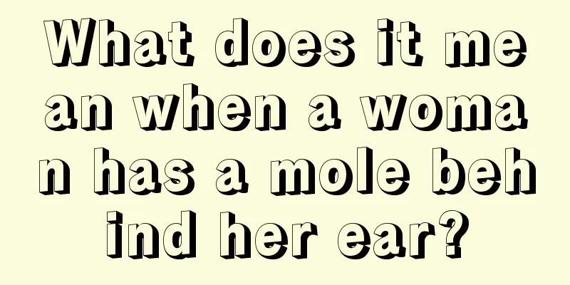 What does it mean when a woman has a mole behind her ear?