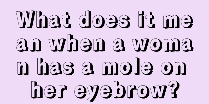 What does it mean when a woman has a mole on her eyebrow?