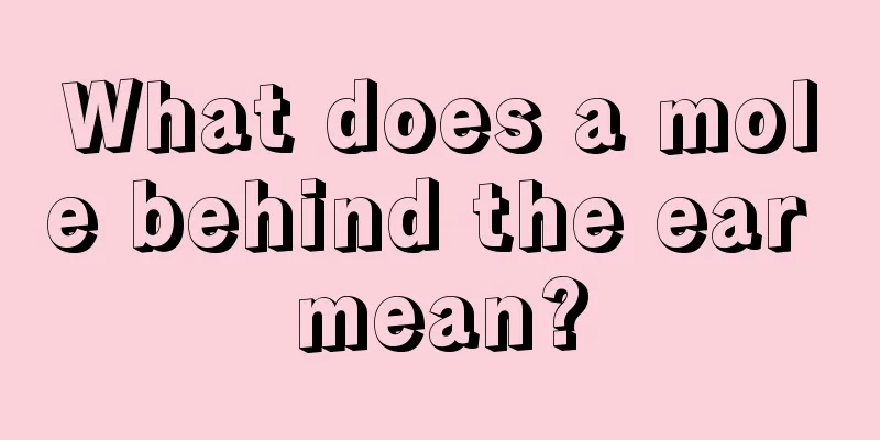 What does a mole behind the ear mean?