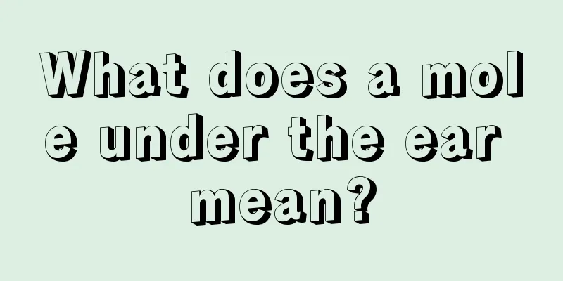 What does a mole under the ear mean?