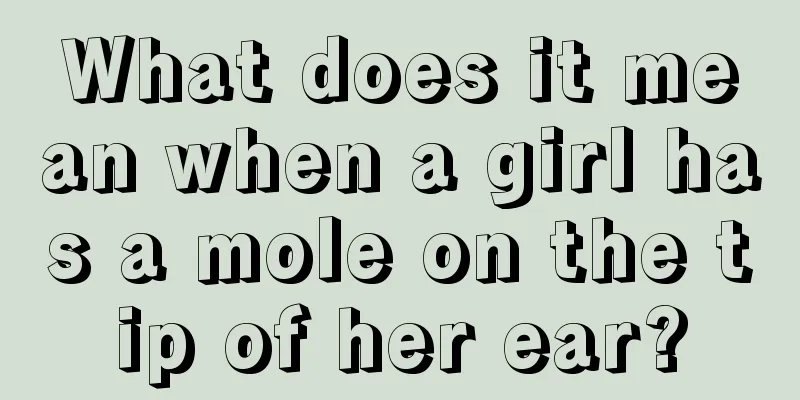 What does it mean when a girl has a mole on the tip of her ear?