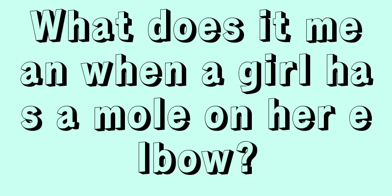 What does it mean when a girl has a mole on her elbow?