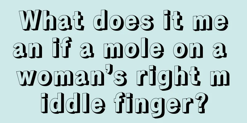 What does it mean if a mole on a woman’s right middle finger?