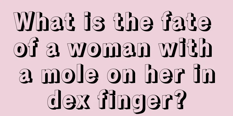 What is the fate of a woman with a mole on her index finger?