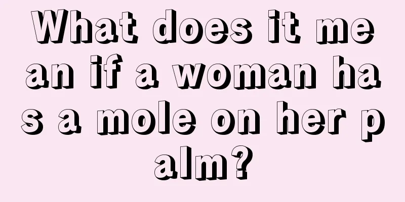 What does it mean if a woman has a mole on her palm?