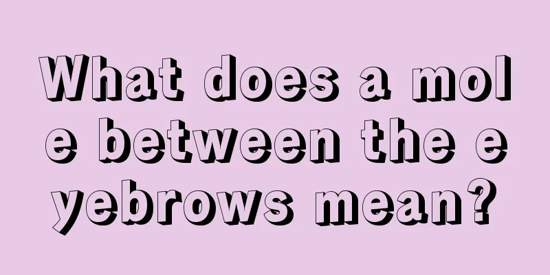 What does a mole between the eyebrows mean?