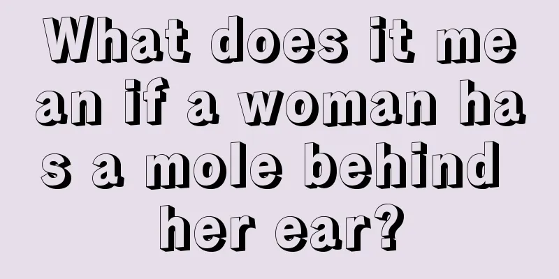 What does it mean if a woman has a mole behind her ear?