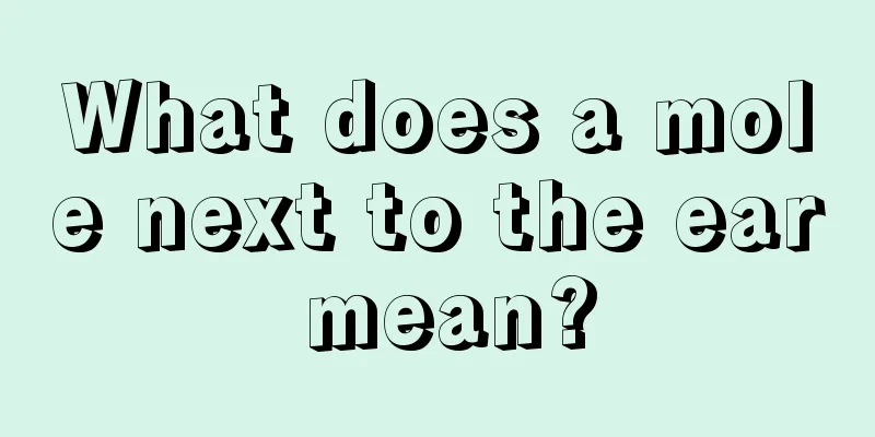 What does a mole next to the ear mean?