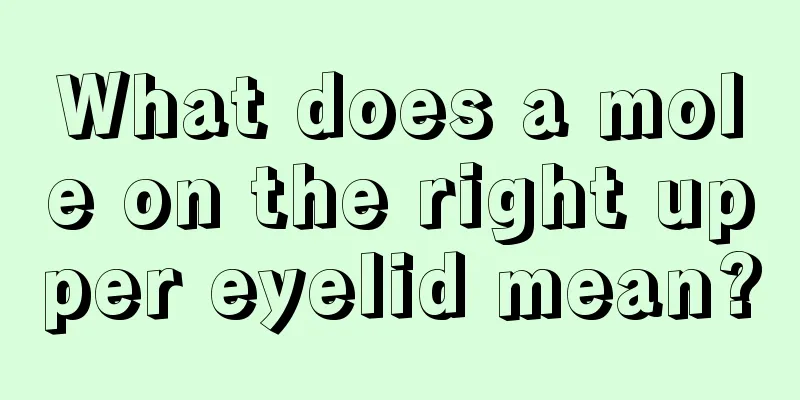What does a mole on the right upper eyelid mean?
