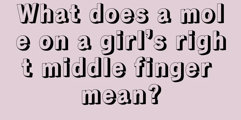 What does a mole on a girl’s right middle finger mean?