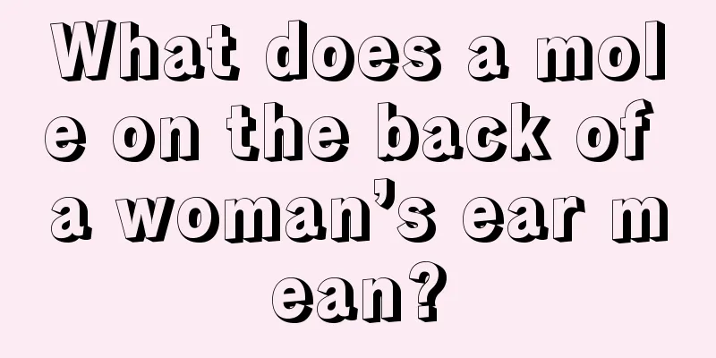 What does a mole on the back of a woman’s ear mean?