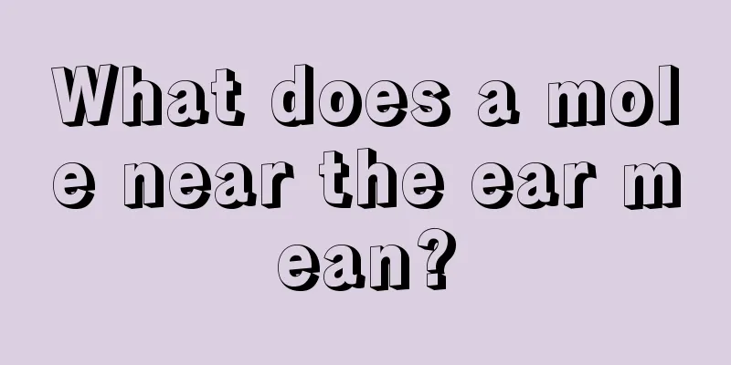 What does a mole near the ear mean?