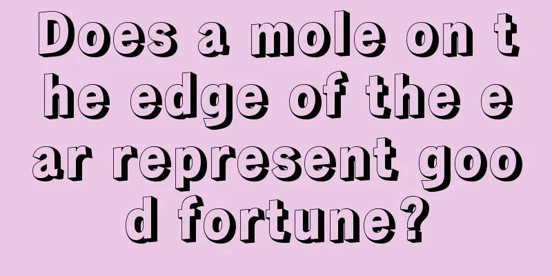Does a mole on the edge of the ear represent good fortune?