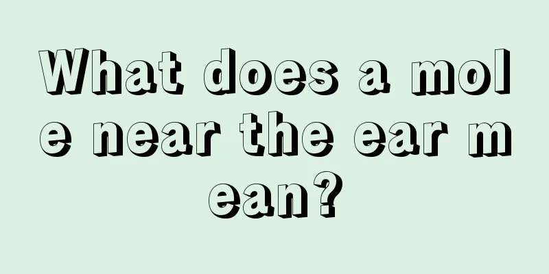 What does a mole near the ear mean?