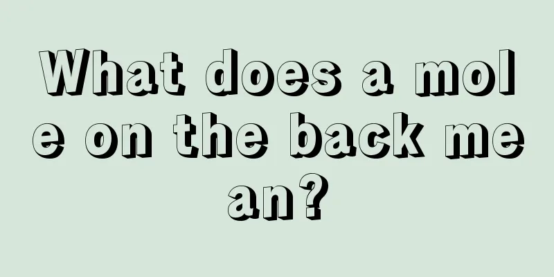 What does a mole on the back mean?