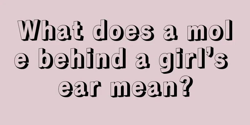 What does a mole behind a girl’s ear mean?