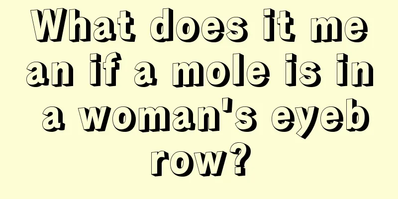 What does it mean if a mole is in a woman's eyebrow?