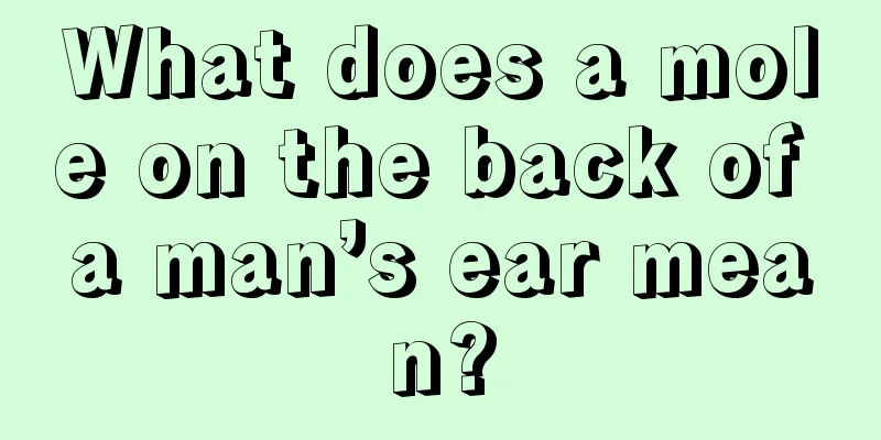 What does a mole on the back of a man’s ear mean?