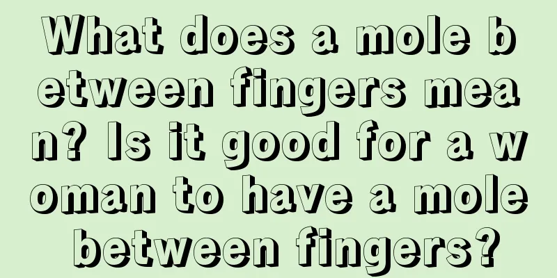 What does a mole between fingers mean? Is it good for a woman to have a mole between fingers?