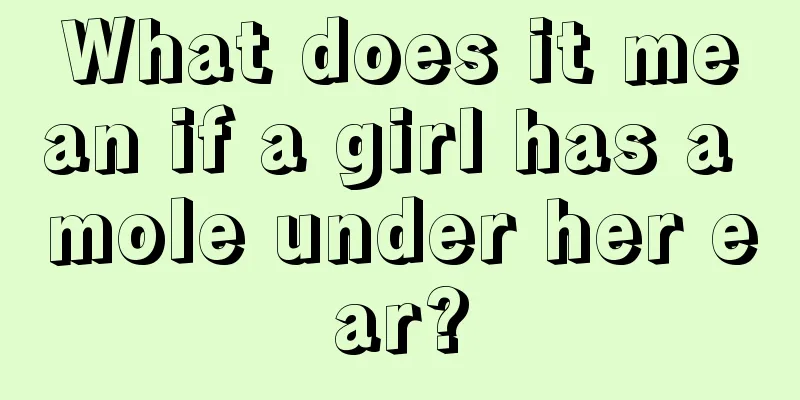 What does it mean if a girl has a mole under her ear?