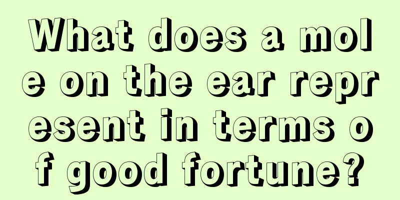 What does a mole on the ear represent in terms of good fortune?
