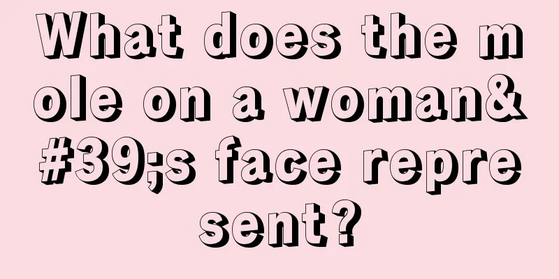 What does the mole on a woman's face represent?