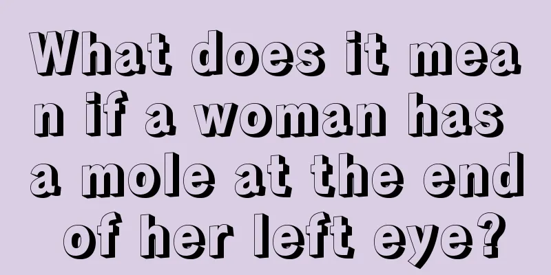 What does it mean if a woman has a mole at the end of her left eye?