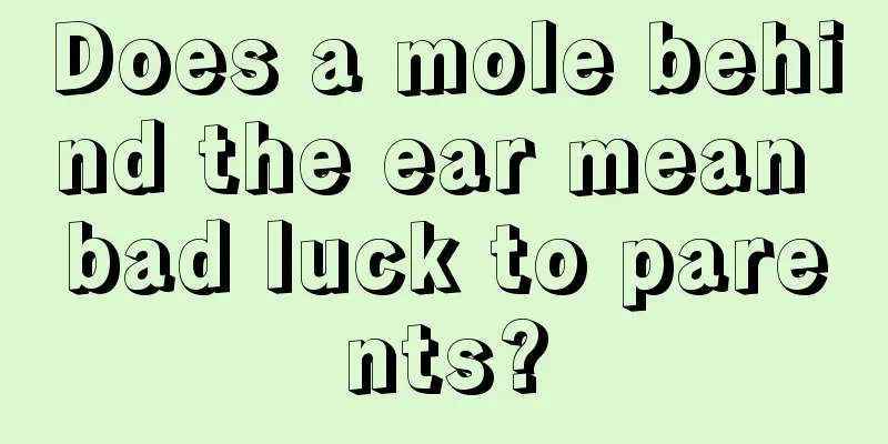 Does a mole behind the ear mean bad luck to parents?