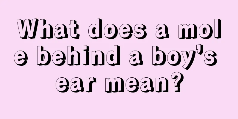 What does a mole behind a boy’s ear mean?
