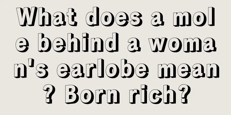 What does a mole behind a woman's earlobe mean? Born rich?