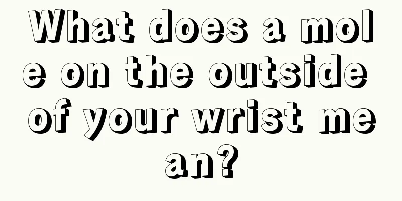 What does a mole on the outside of your wrist mean?