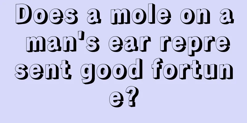 Does a mole on a man's ear represent good fortune?