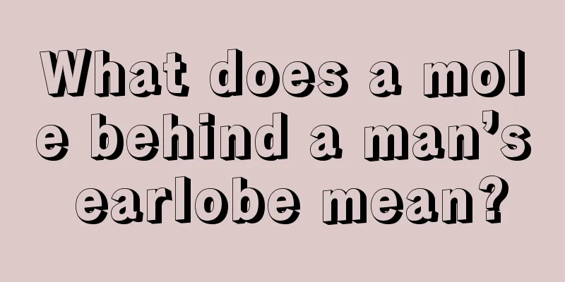 What does a mole behind a man’s earlobe mean?