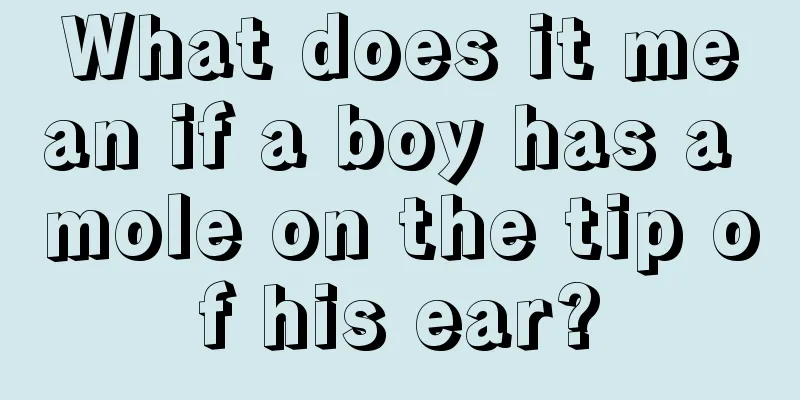 What does it mean if a boy has a mole on the tip of his ear?