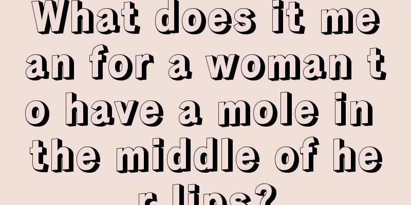 What does it mean for a woman to have a mole in the middle of her lips?