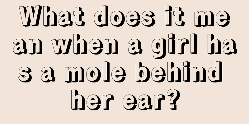 What does it mean when a girl has a mole behind her ear?