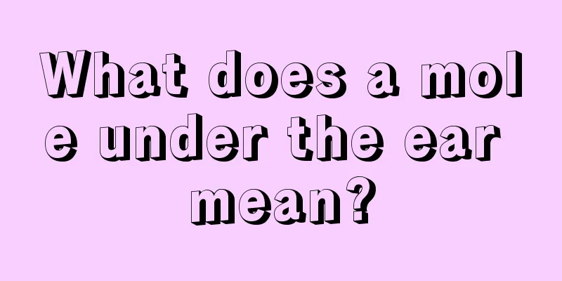 What does a mole under the ear mean?