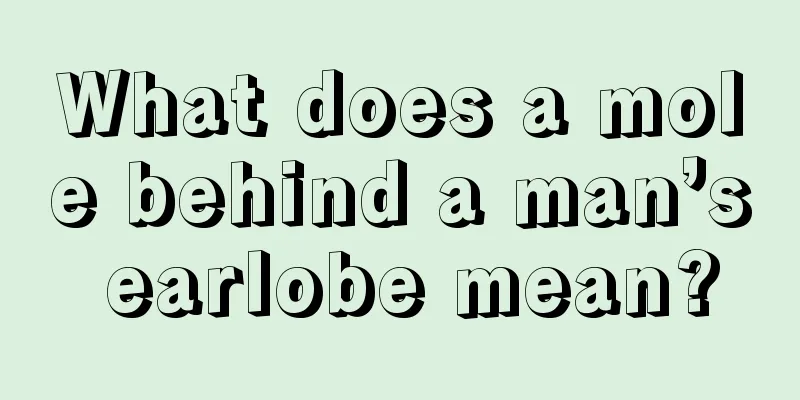 What does a mole behind a man’s earlobe mean?