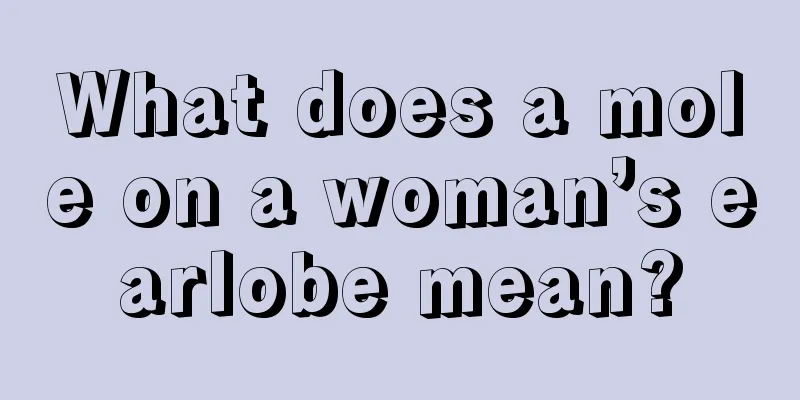 What does a mole on a woman’s earlobe mean?