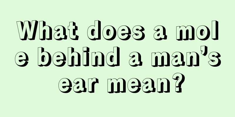 What does a mole behind a man’s ear mean?