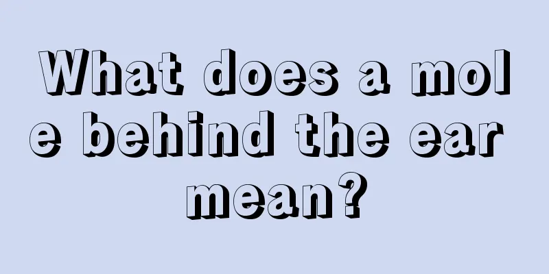 What does a mole behind the ear mean?