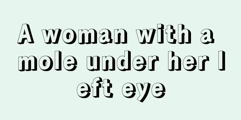 A woman with a mole under her left eye