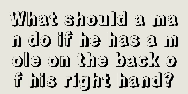 What should a man do if he has a mole on the back of his right hand?