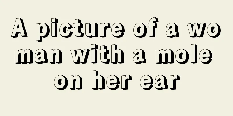A picture of a woman with a mole on her ear