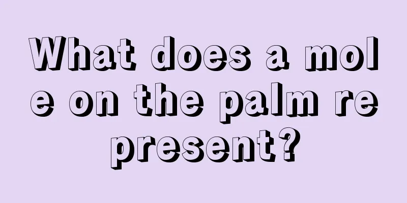 What does a mole on the palm represent?