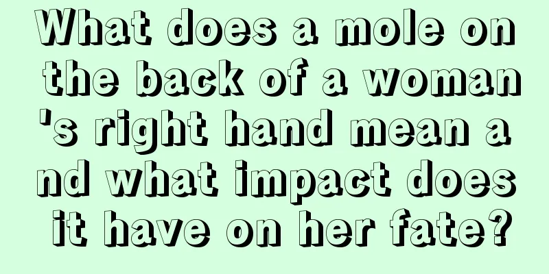 What does a mole on the back of a woman's right hand mean and what impact does it have on her fate?